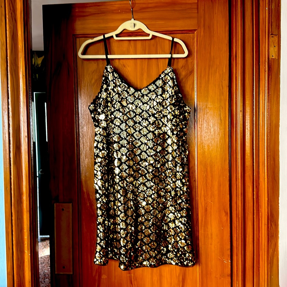 Adorable black and gold sequin mini dresss